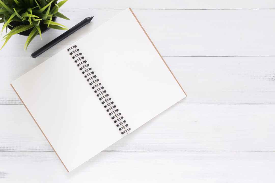 white blank notebook pictured on our music blog.